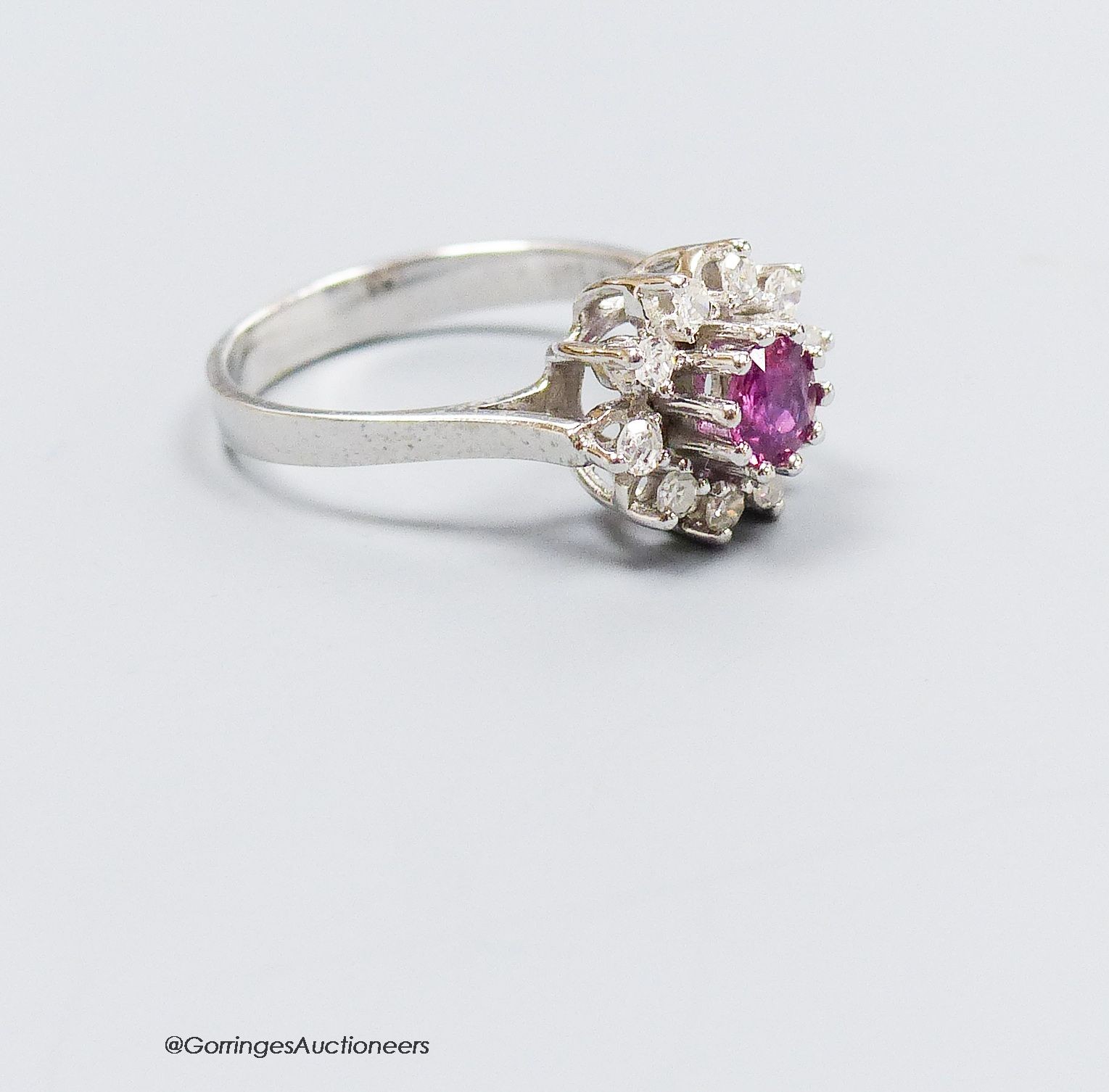 A 14k white gold pink sapphire and diamond cluster ring, size L, gross 3g 150-200